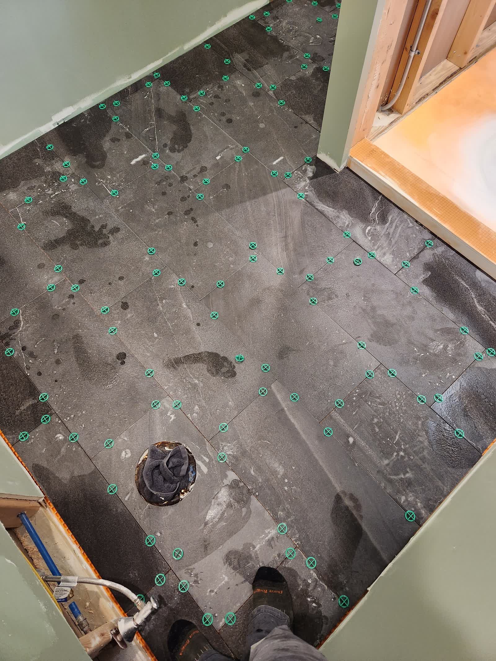 Heated floor and shower niche winter construction custom bathroom maine