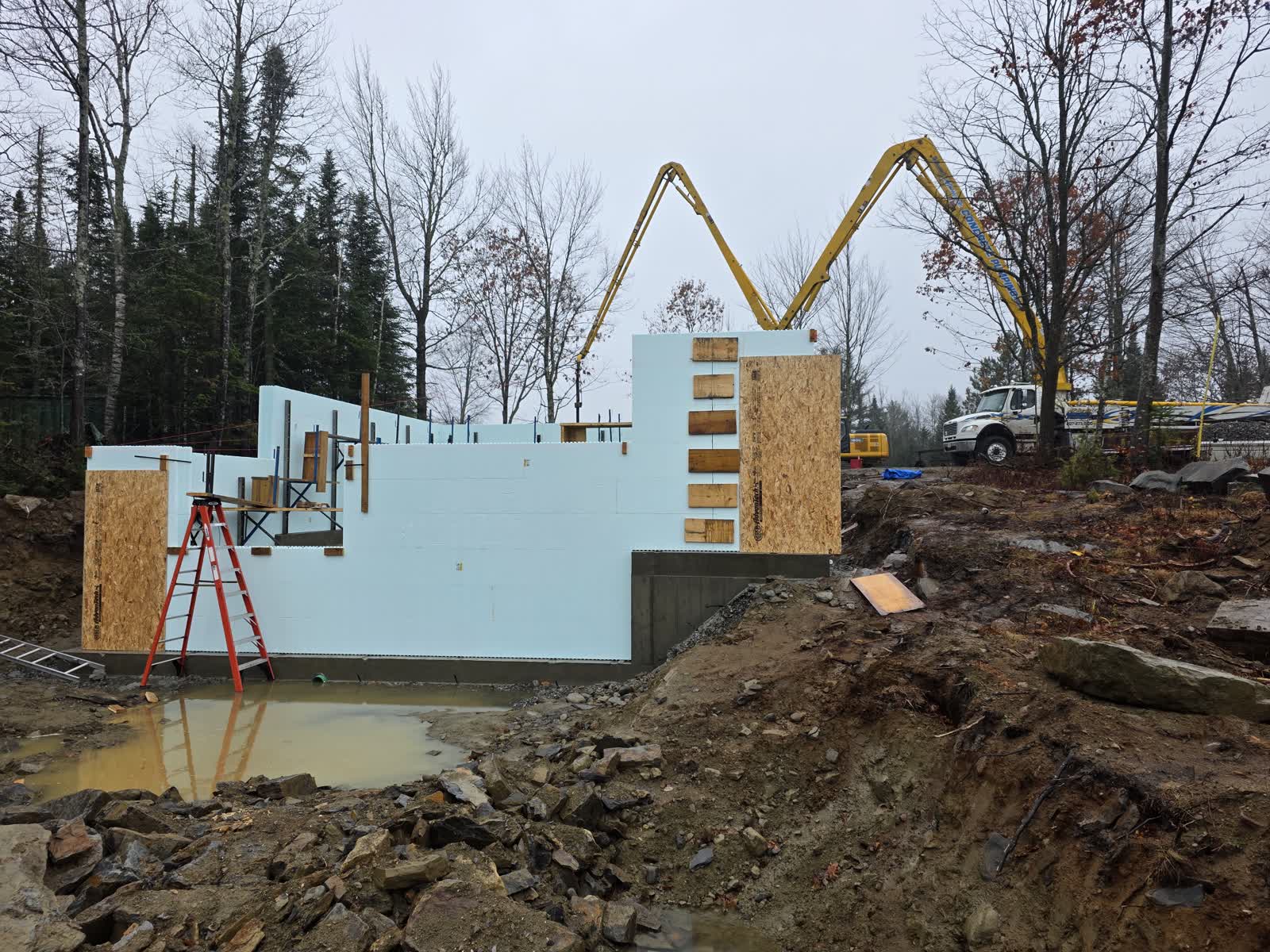 Foundation layout survey winter construction phillips maine