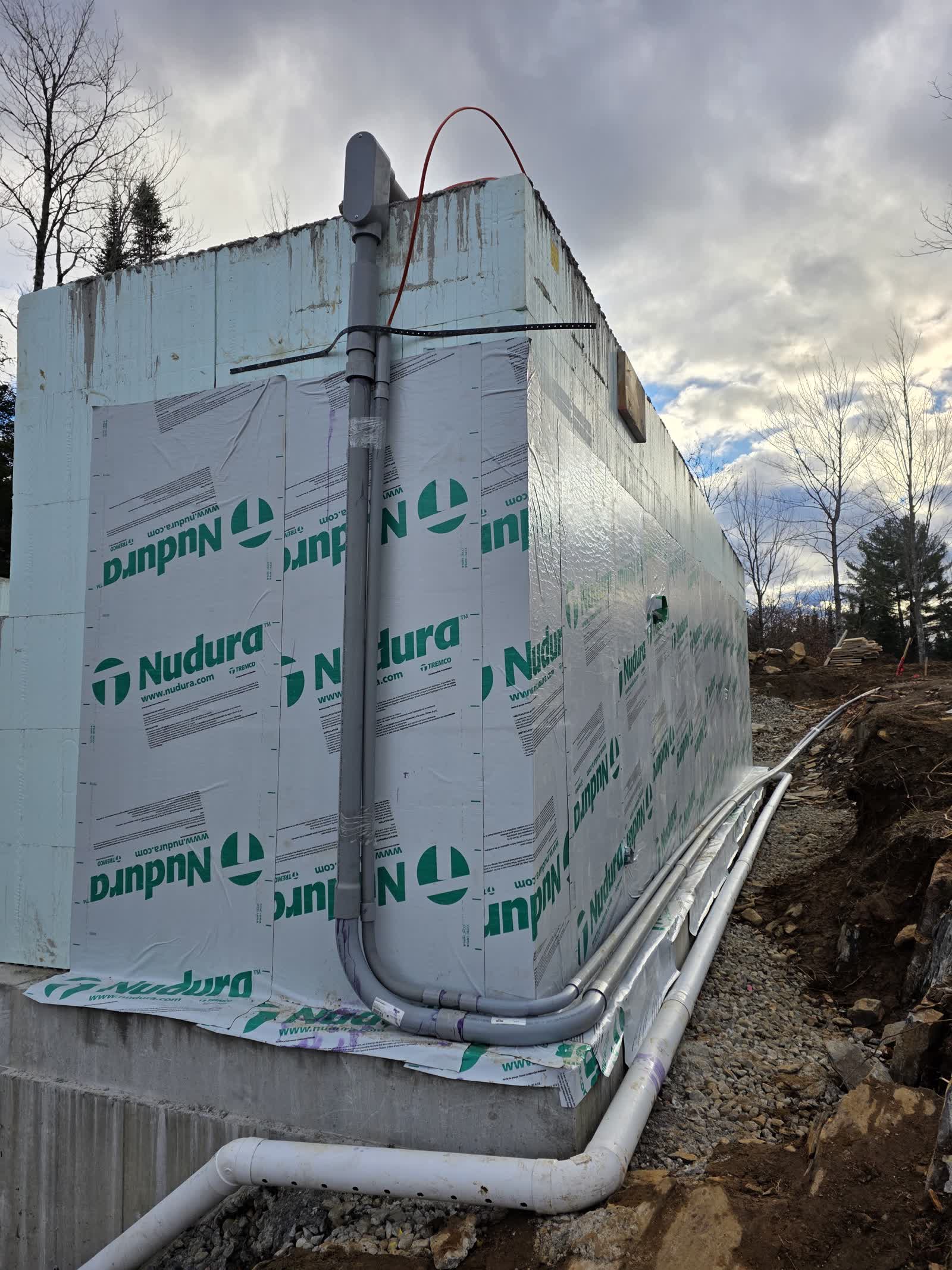 Foundation waterproofing insulation winter construction phillips maine