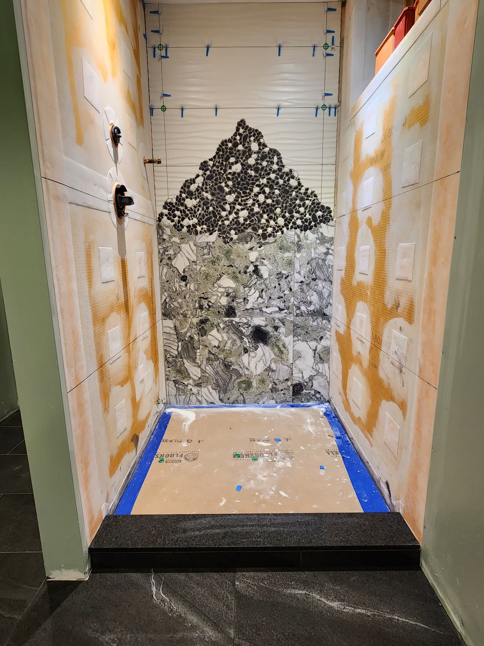 Mosaic and marble wall tile winter construction custom bathroom maine