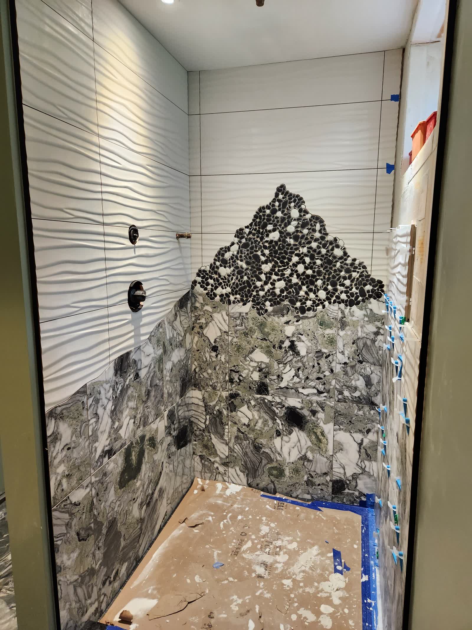 Mosaic feature and niche winter construction custom bathroom maine