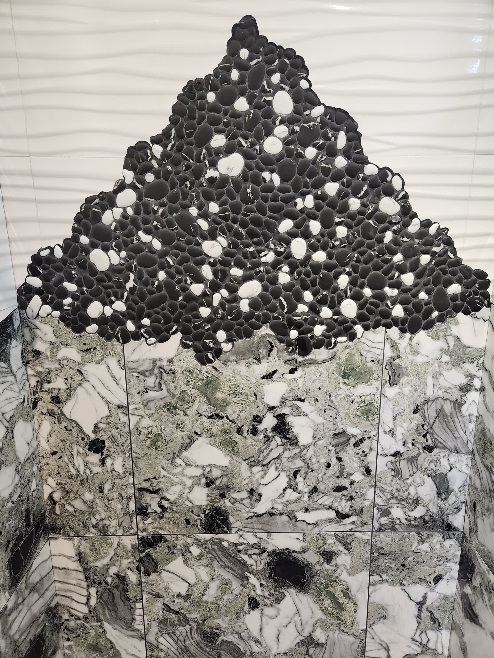 Custom pebble mosaic marble wall winter construction custom bathroom maine