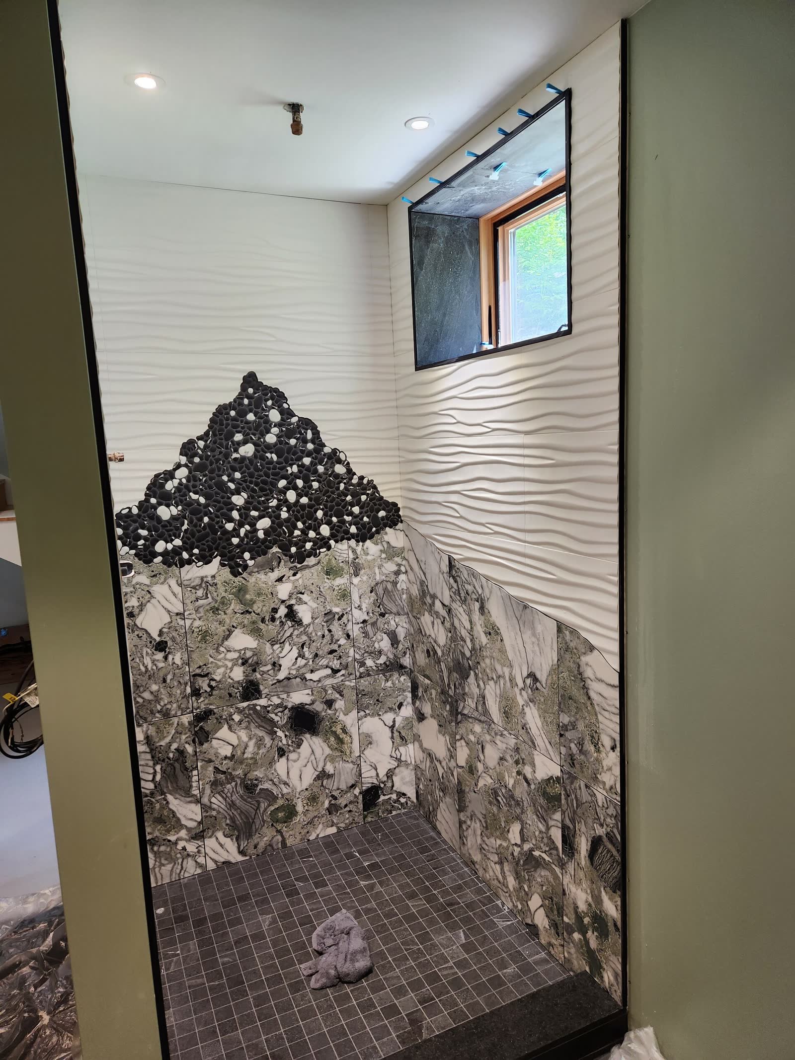 Textured feature tile window winter construction custom bathroom maine