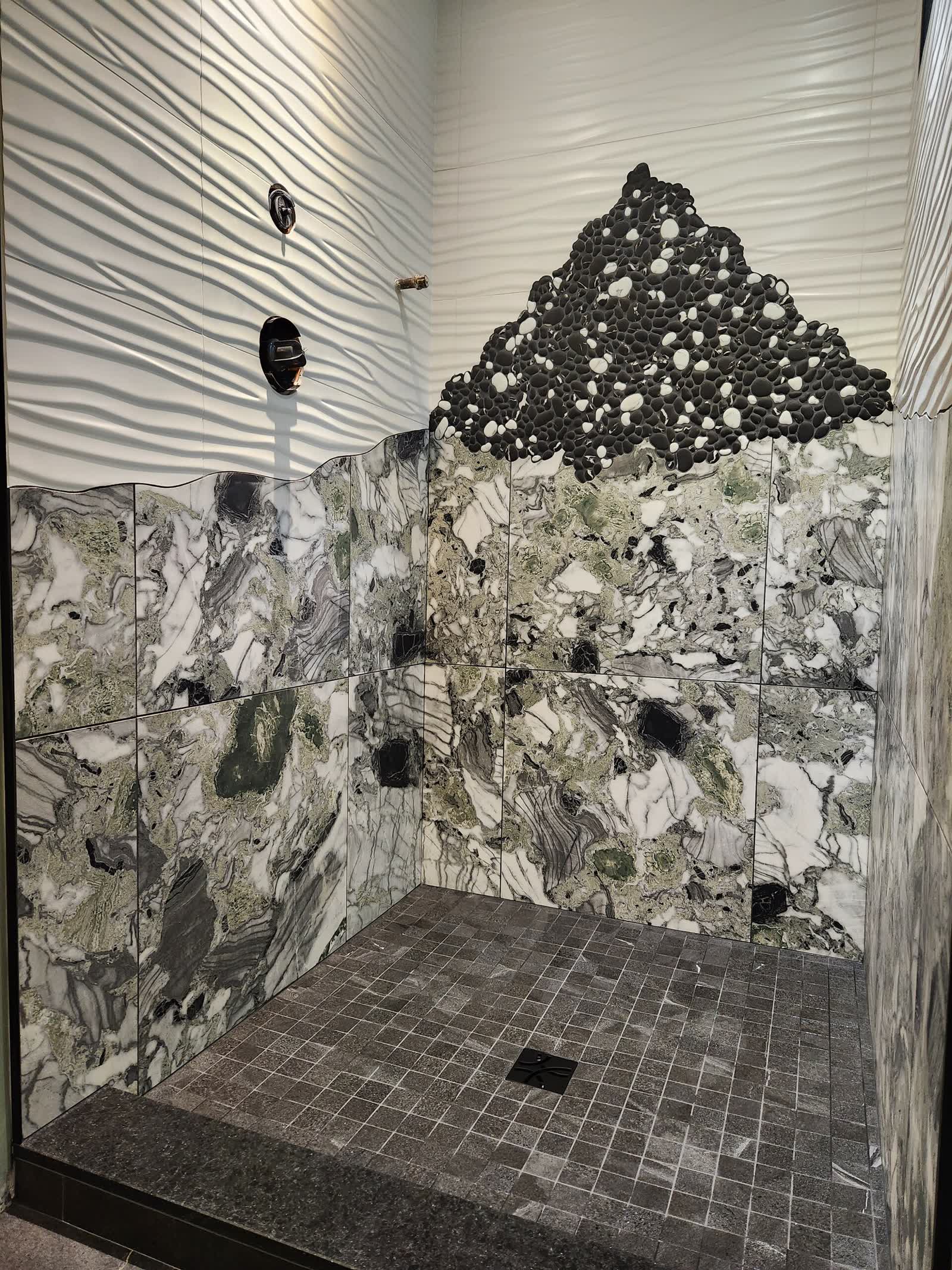 Completed custom shower tilework winter construction custom bathroom maine