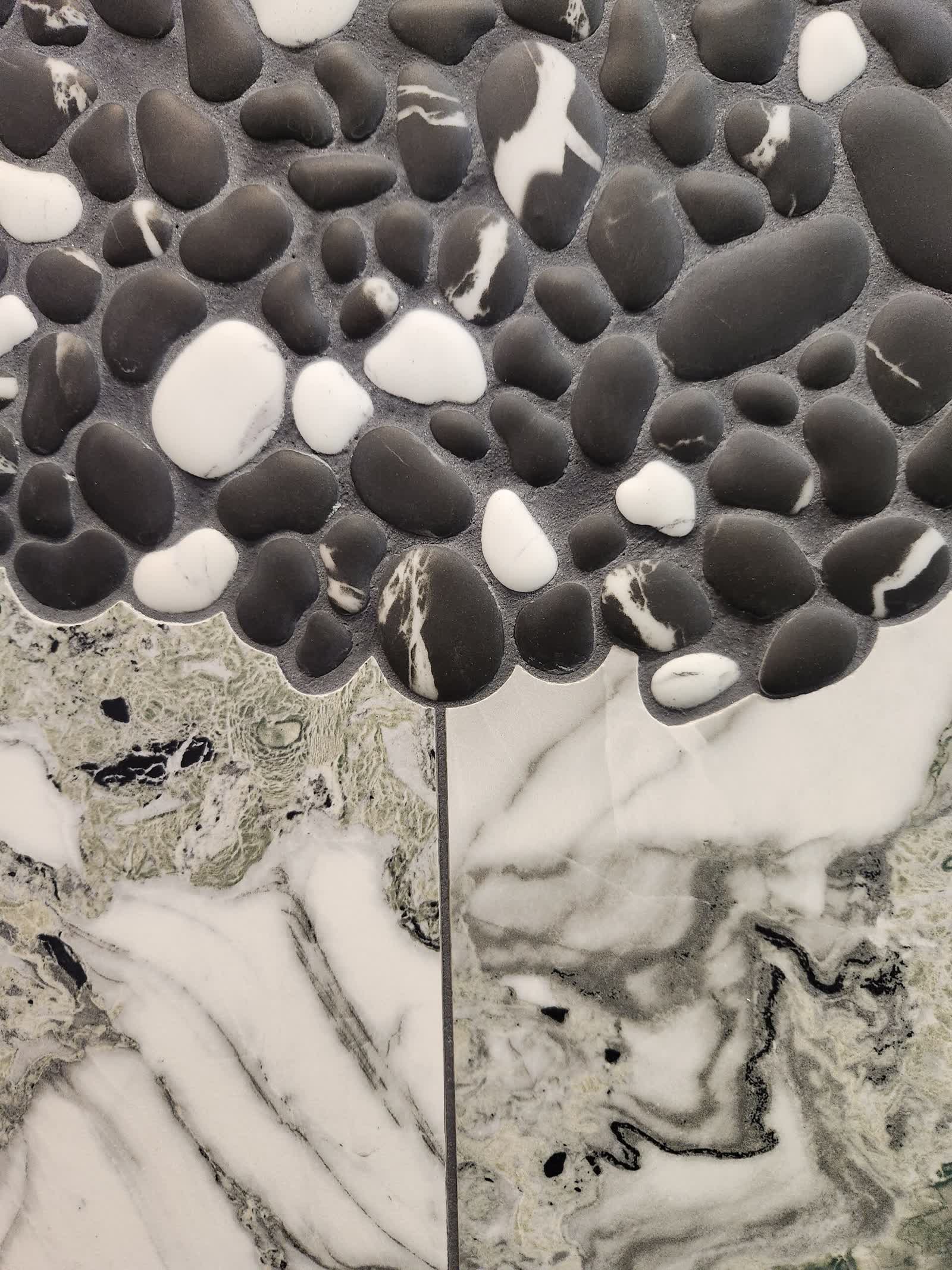 Pebble mosaic closeup winter construction custom bathroom maine