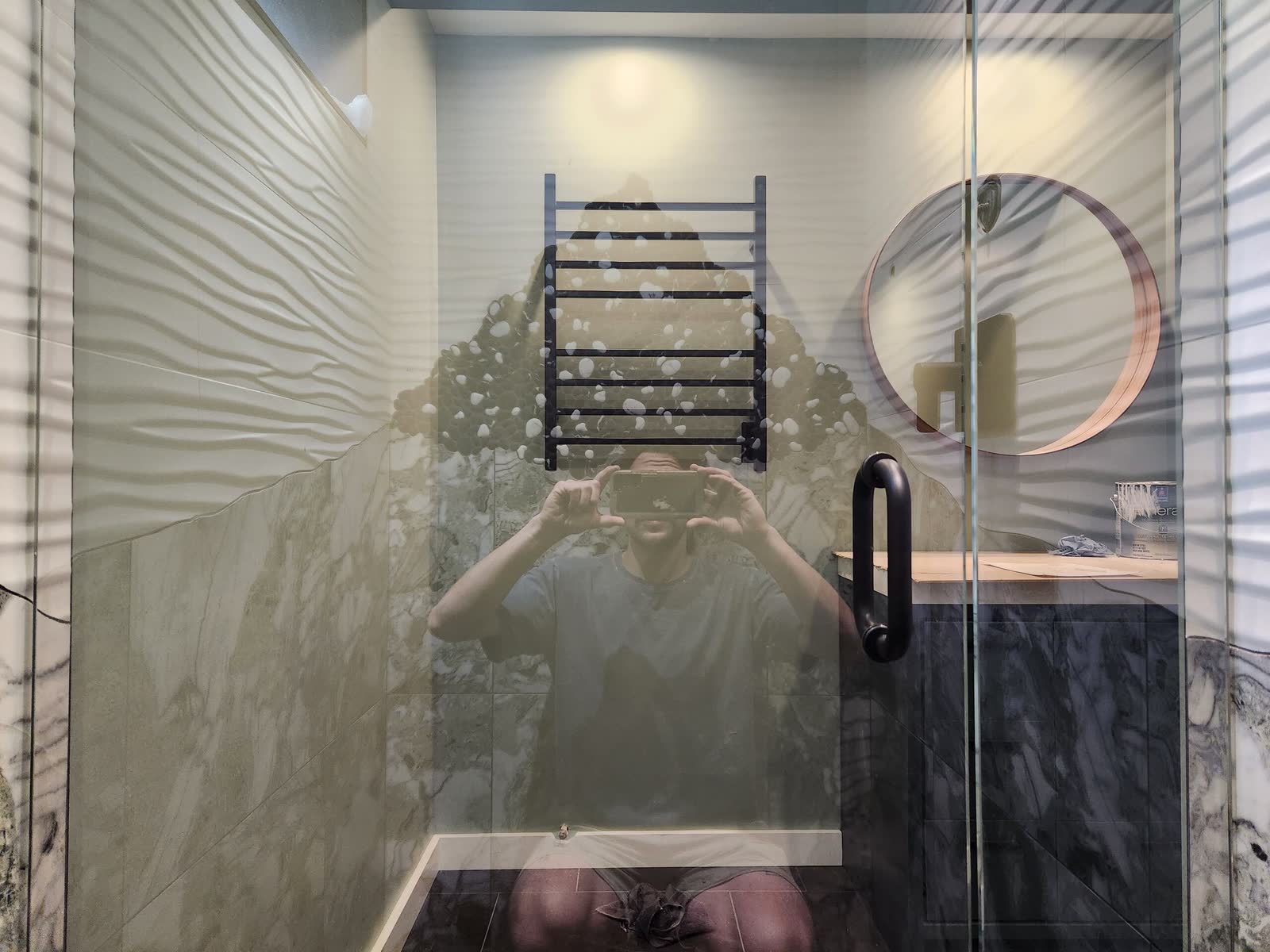 Completed marble tiled shower winter construction custom bathroom maine