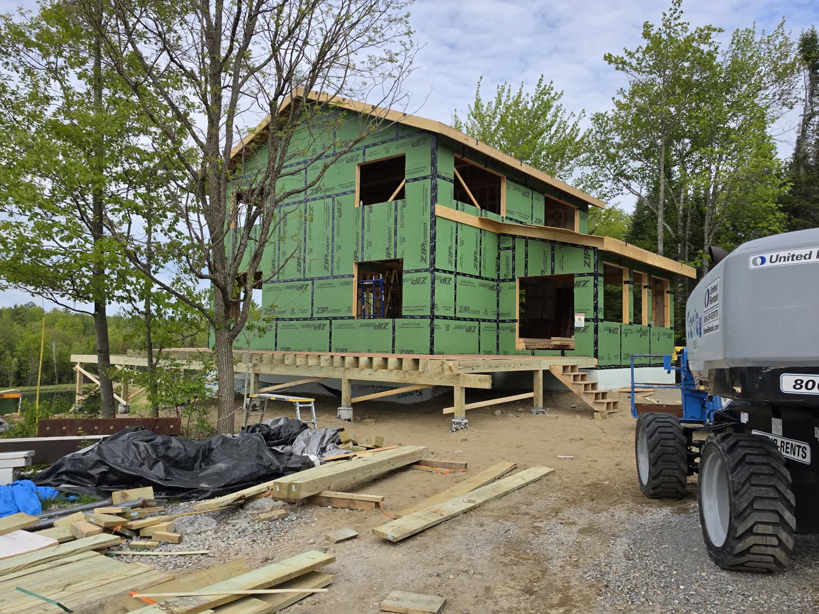 Exterior weatherization rear elevation winter construction phillips maine