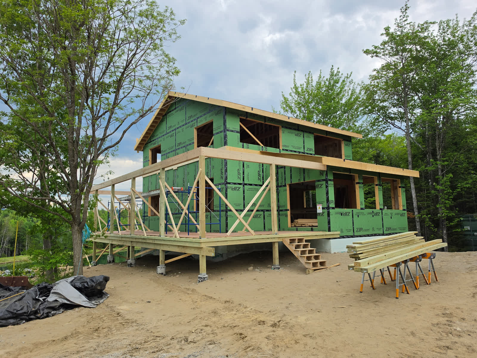 Exterior weatherization rear elevation winter construction phillips maine