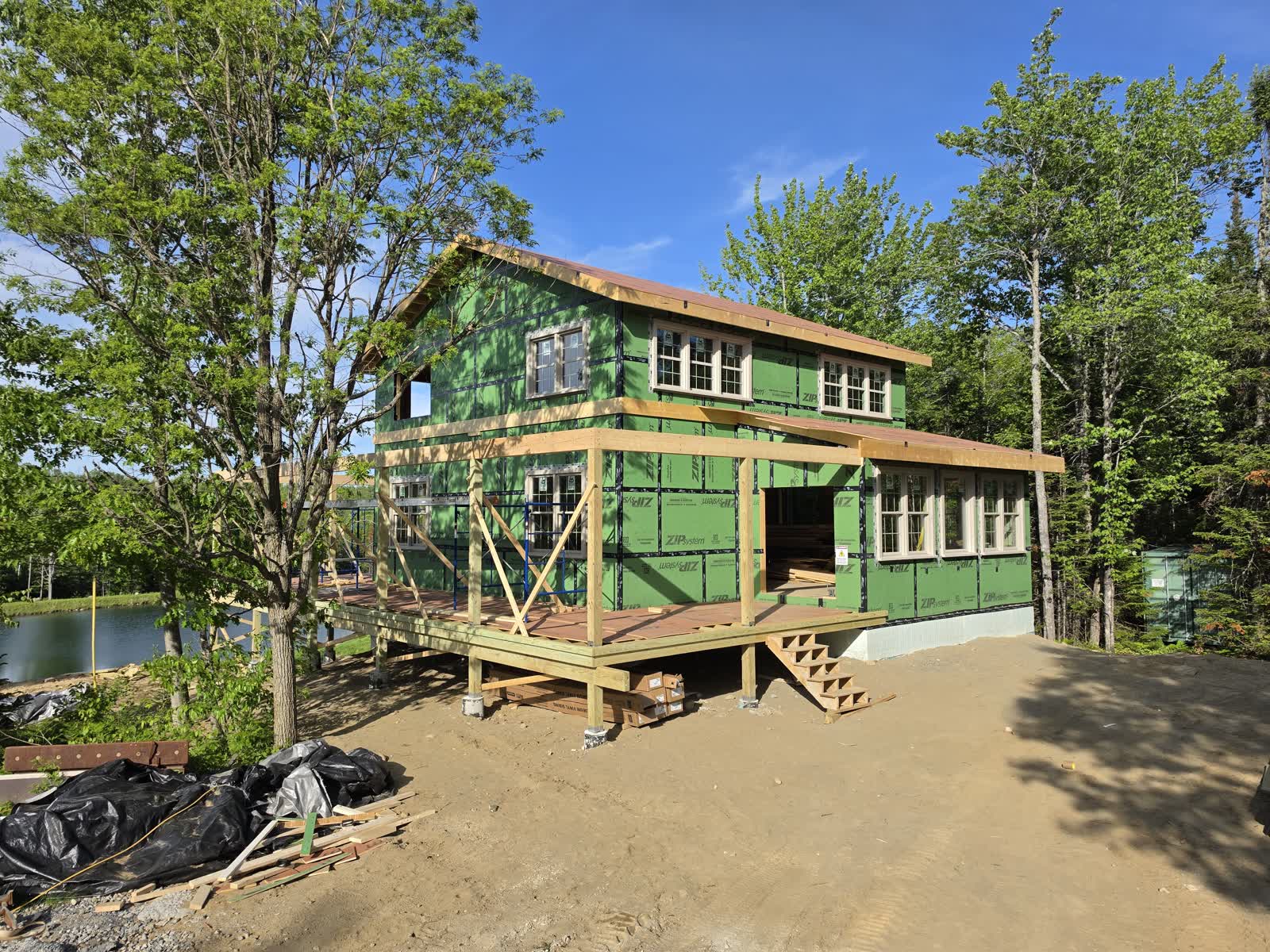 Exterior weatherization rear elevation winter construction phillips maine