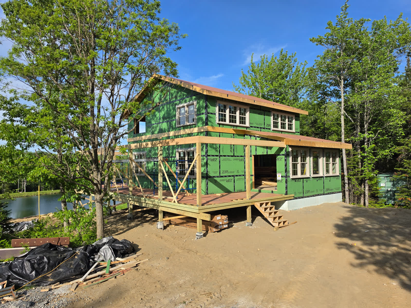 Exterior weatherization rear elevation winter construction phillips maine