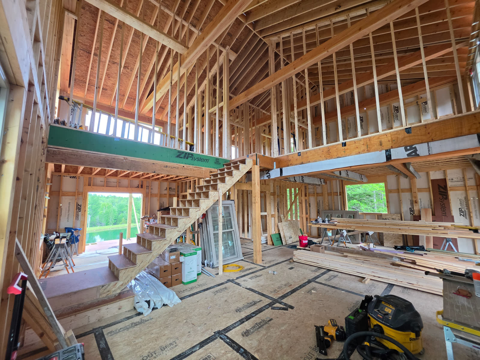 Interior staircase vaulted ceiling winter construction phillips maine