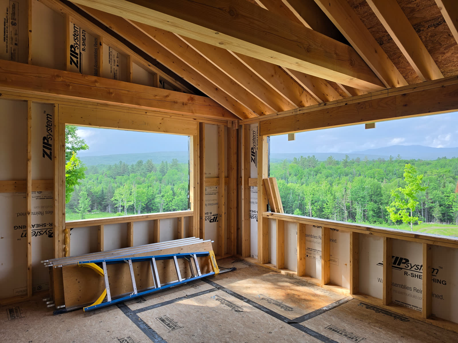 Interior framing mountain view windows winter construction phillips maine