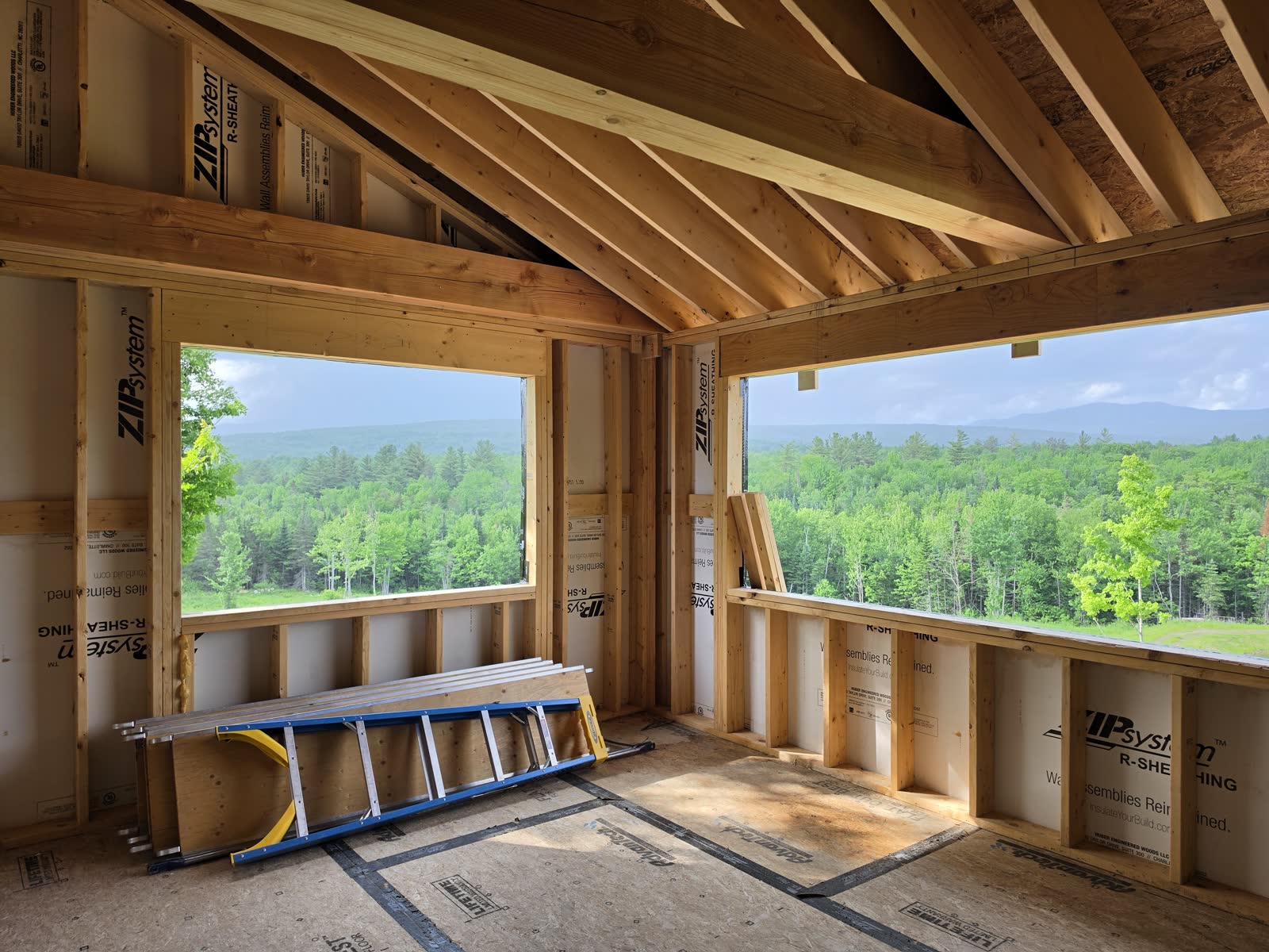 Interior framing mountain view windows winter construction phillips maine