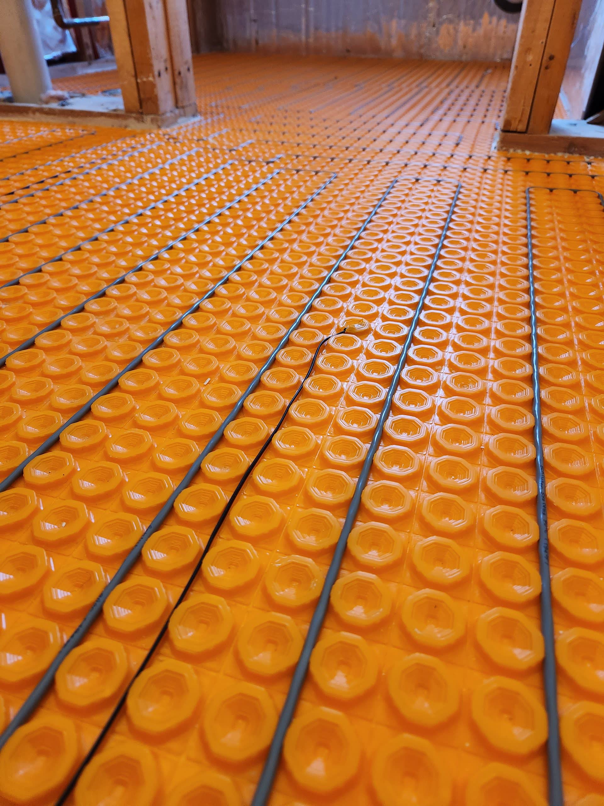 Radiant heated floor system winter construction bathroom remodel maine