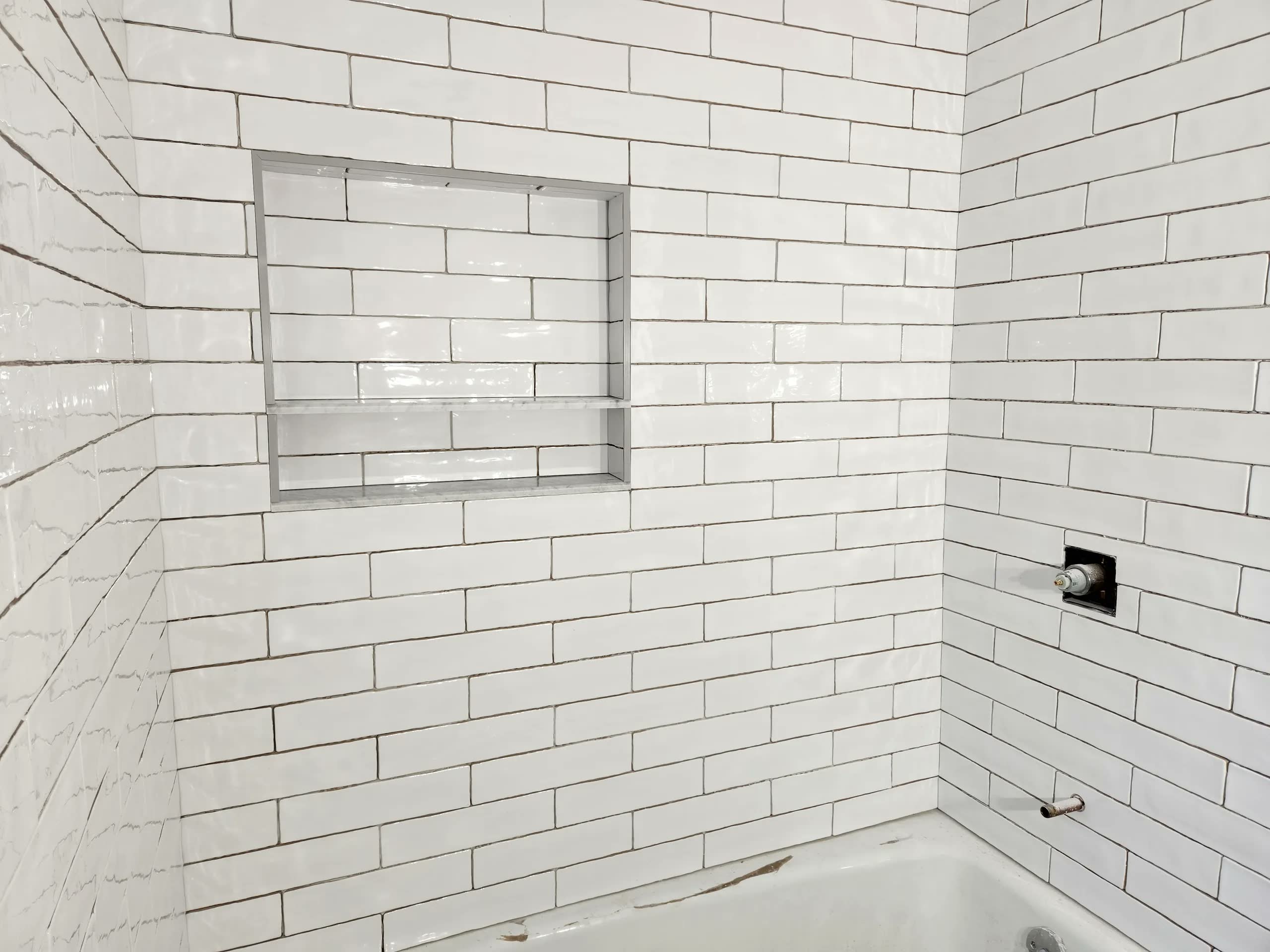 Tiled shower niche detail winter construction bathroom remodel maine
