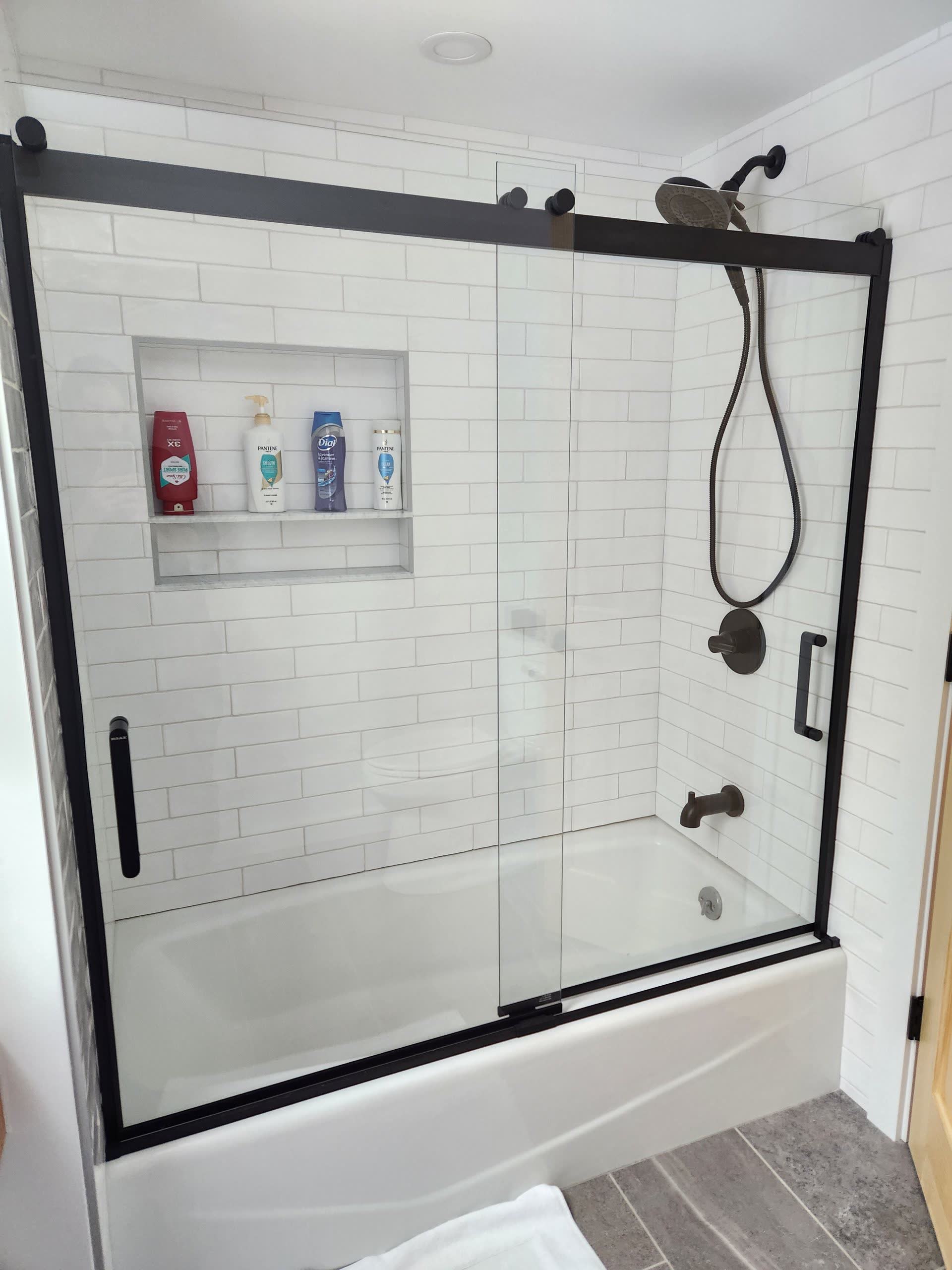 Glass shower door detail winter construction bathroom remodel maine