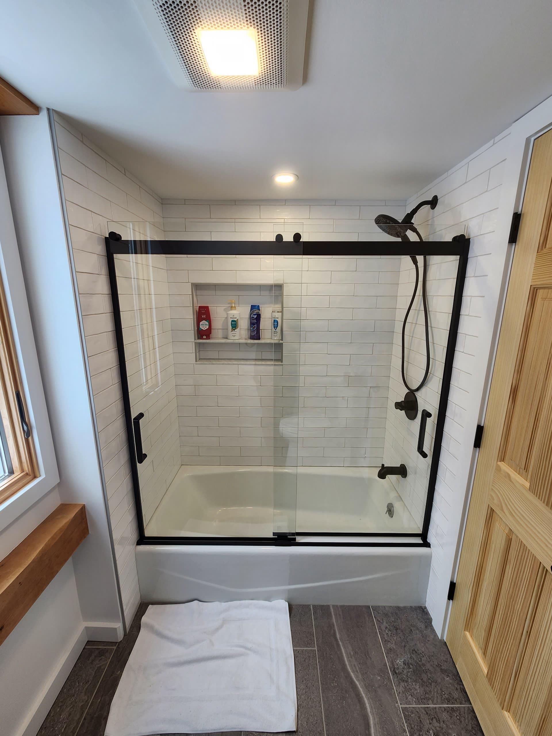 Finished glass tile shower winter construction bathroom remodel maine