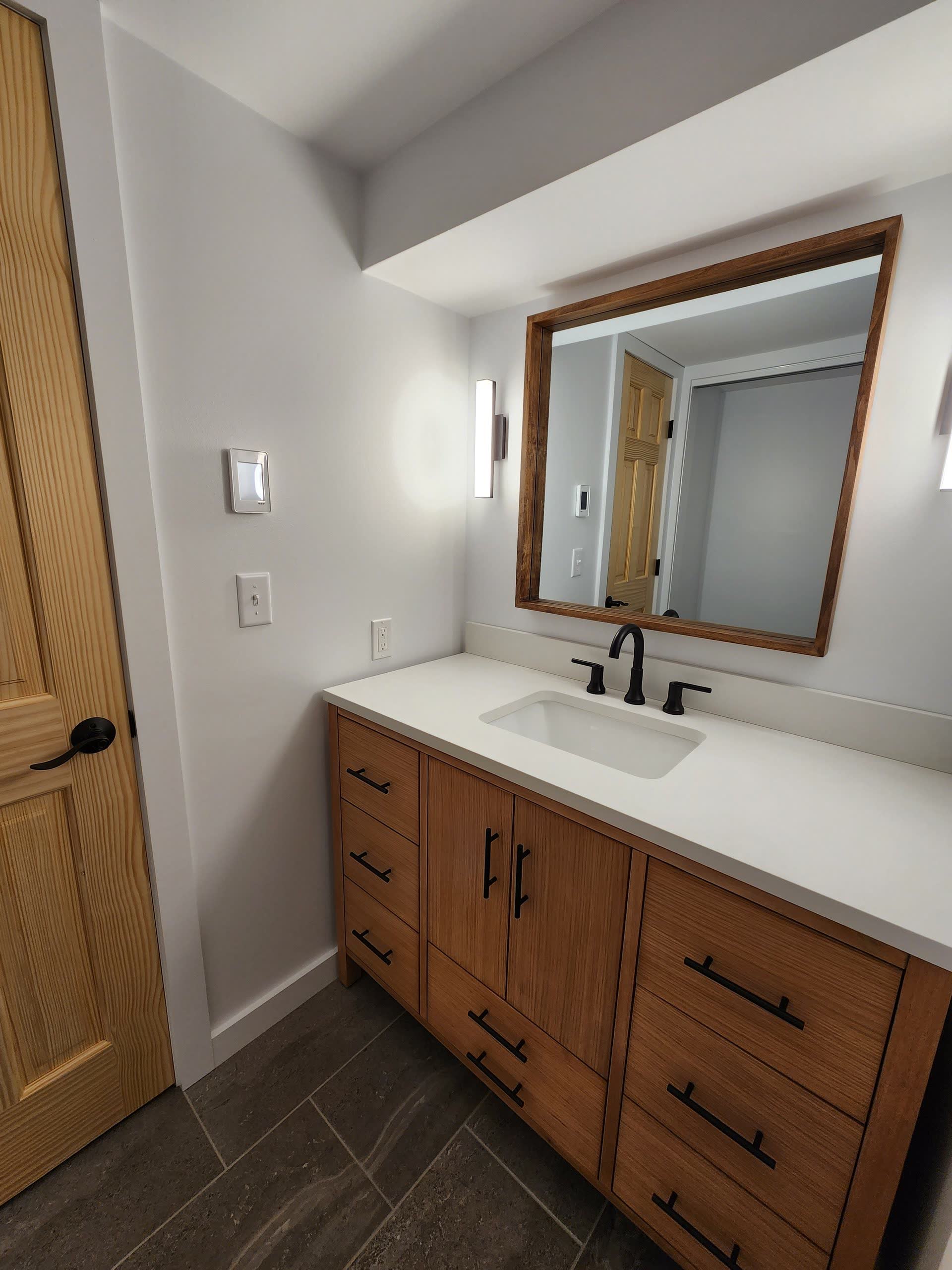 Finished bathroom vanity winter construction bathroom remodel maine