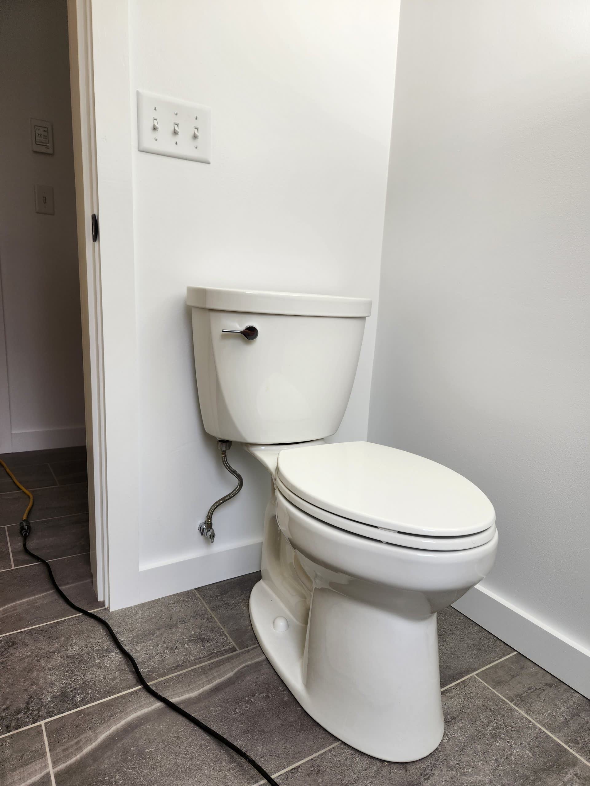 Finished bathroom toilet floor winter construction bathroom remodel maine