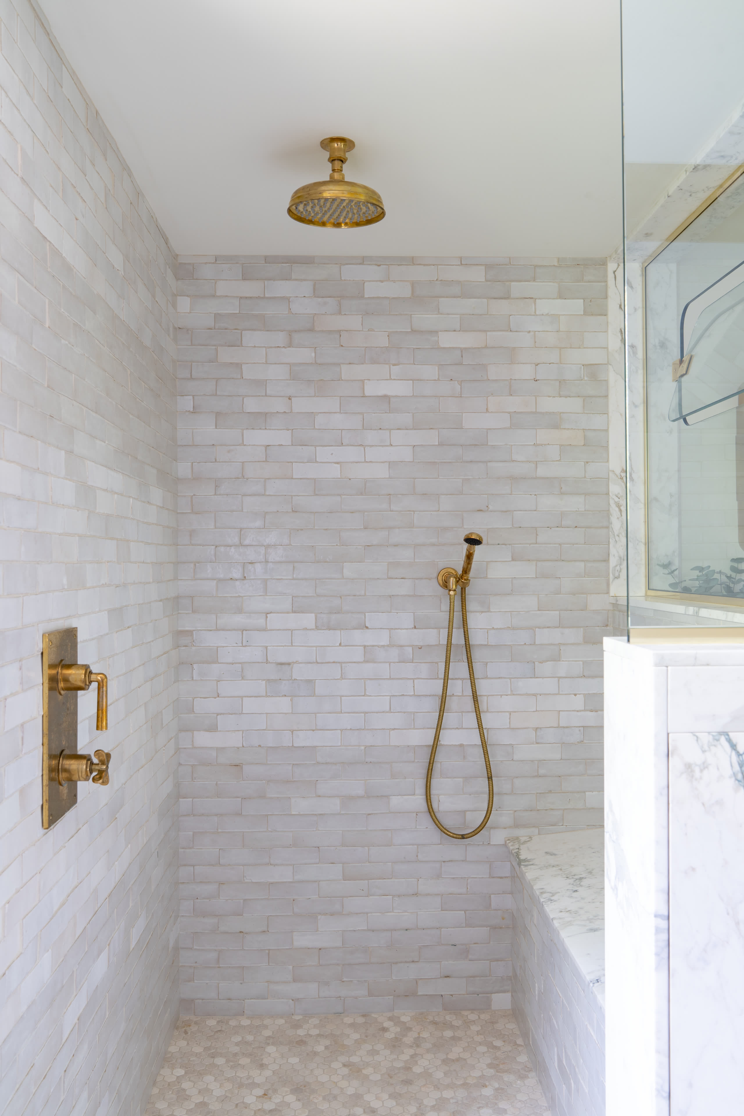 Walk in marble shower brass fixtures winter construction phillips maine