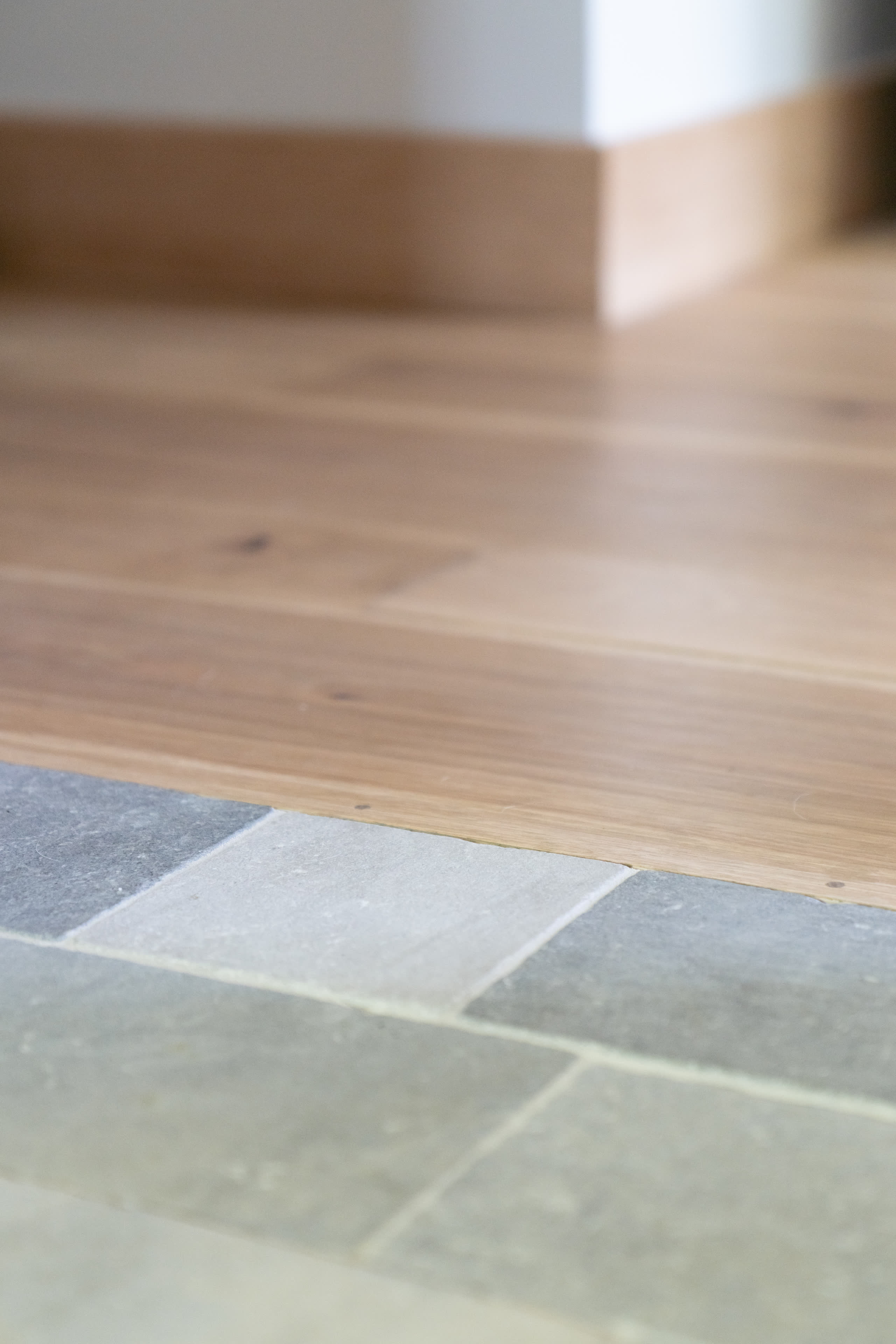 White oak stone tile floor detail winter construction phillips maine